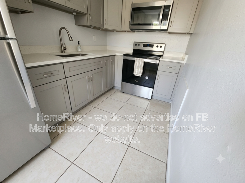 First-Floor Updated 2BR Condo | No Carpet | Pool Access property image