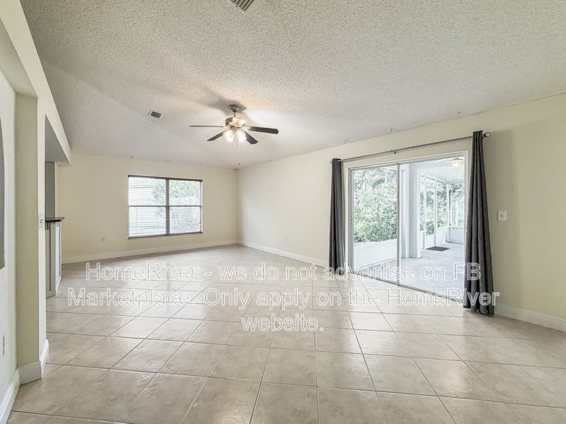 Lakefront Living | Gated Community | Screened Patio with Hot Tub property image