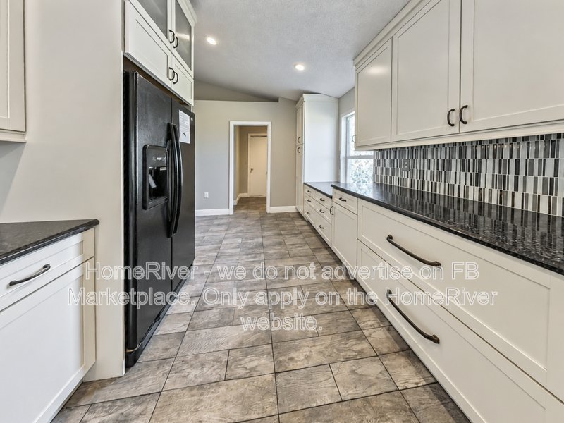 Lakefront Living | Gated Community | Screened Patio with Hot Tub property image