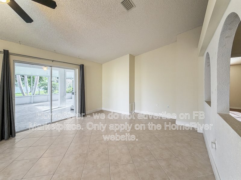 Lakefront Living | Gated Community | Screened Patio with Hot Tub property image