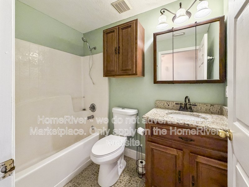 Lakefront Living | Gated Community | Screened Patio with Hot Tub property image