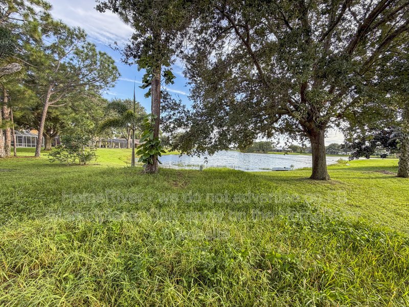 Lakefront Living | Gated Community | Screened Patio with Hot Tub property image